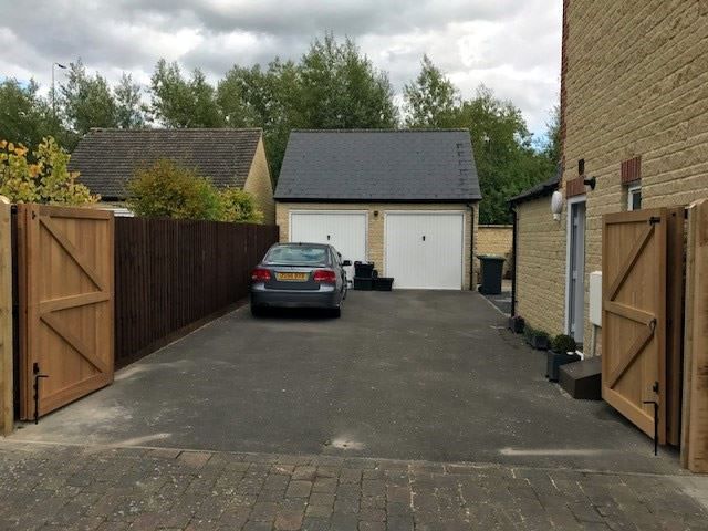 Bi-fold hardwood gates in Witney